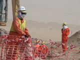 Workers in a sandstorm